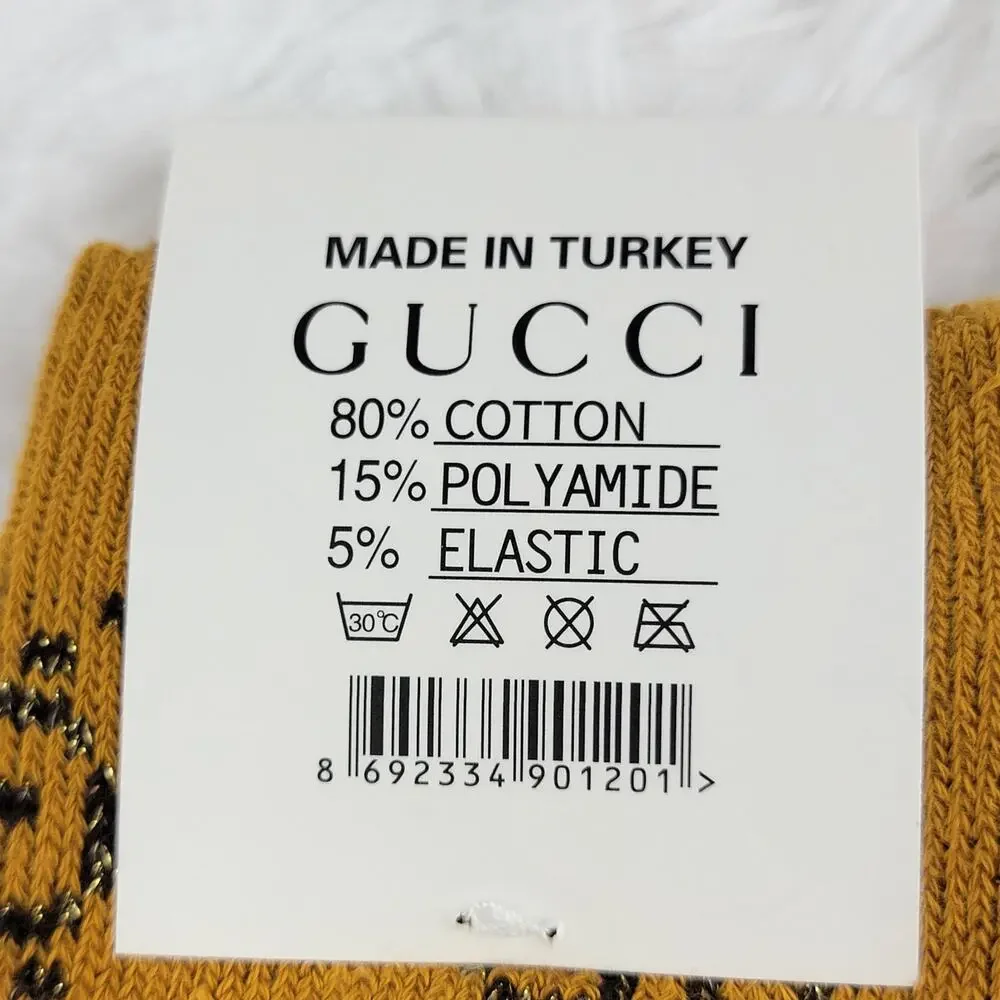 Gucci new tags
